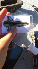 tiny space shuttle hidden in a rock under a bench in Miami. There is actually a cache on the International Space Station so if anyone is inspired after this, we would love to hear about it :)